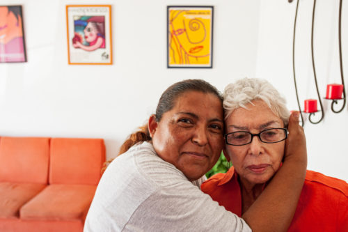 Esther Chavez Cano is hugged by a patient at Casa Amiga in Cd. Juarez September 9, 2008. Photo by Christ Chavez 
