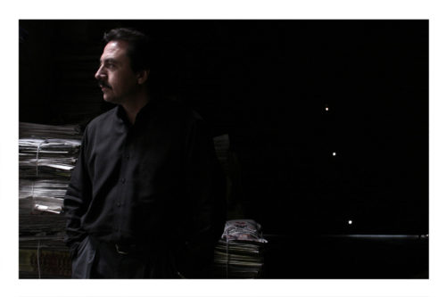 Alfredo Quijano, editor of El Norte, a newspaper in Ciudad Juarez, stands to the left of three bullet holes. The bullet holes were made after El Norte reported that there was false evidence in the case of Mario Anaya, Gustavo Meza’s lawyer. State police shot and killed Anaya stating that they had mistaken him for an alleged murderer. February 05, 2004 Photo by Christ Chavez 